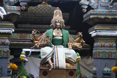 Low angle view of statues at mariamman temple