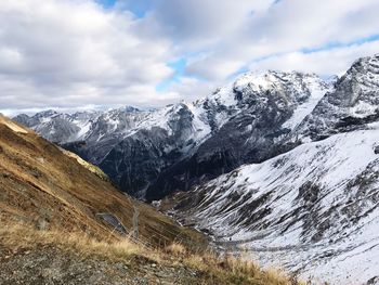 Scenic view of snowcapped mountains against sky