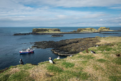 High angle view of sea shore against sky