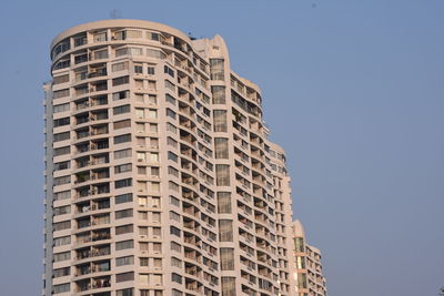 Low angle view of modern building against sky