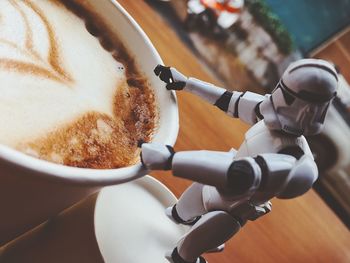 High angle view of coffee cup on table