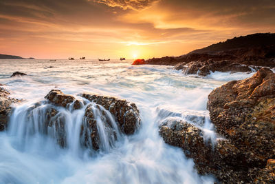 Scenic view of sea against sky during sunset