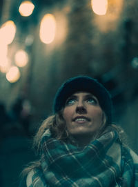 Portrait of young woman in winter at night