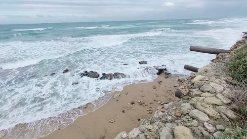 Scenic view of beach against sky