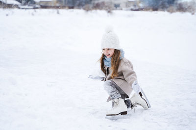 Full length of woman in snow