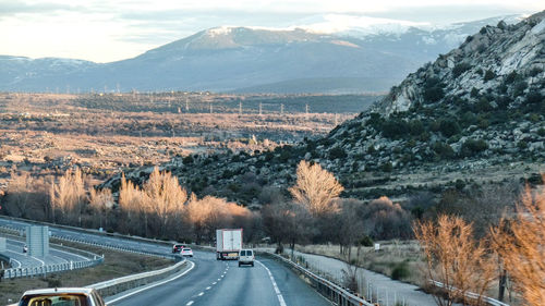 Aerial view of road amidst mountains