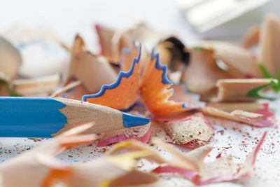 Close-up of colored pencils on table