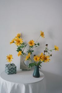 Close-up of flowers on table