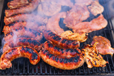 Close-up of meat on barbecue grill