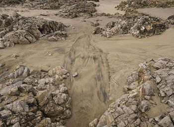 High angle view of rocks on shore