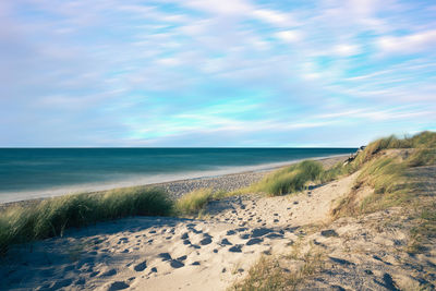 Scenic view of beach against sky