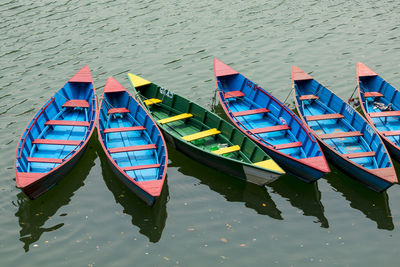 High angle view of boats moored in lake