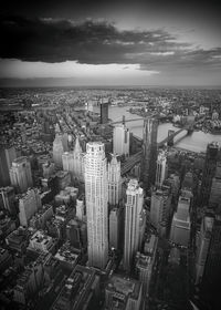 High angle view of modern buildings in city against sky