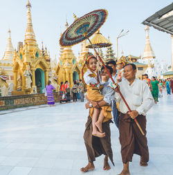 Group of people outside temple