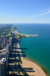 High angle view of city against sea