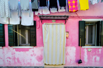 Clothes drying outside building