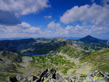 Aerial view of landscape against cloudy sky