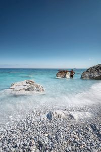 Scenic view of sea against clear sky