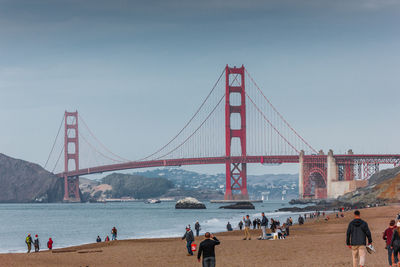 People on suspension bridge