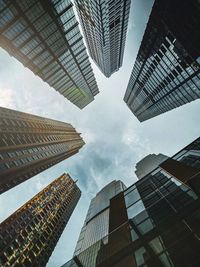 Low angle view of modern buildings against sky