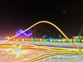 Light trails against sky at night