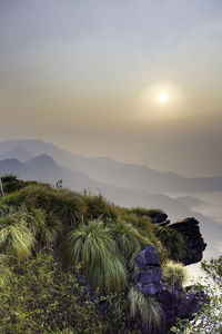 Scenic view of mountains against sky during sunset