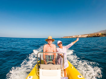 Panoramic view of sea against clear blue sky