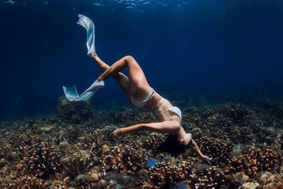 Man swimming in sea