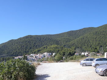 View of road against clear blue sky