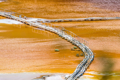 High angle view of bridge over river during winter