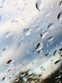 Full frame shot of wet glass window