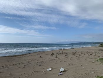 Scenic view of beach against sky