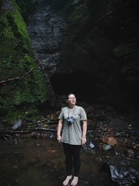 Portrait of man standing in lake