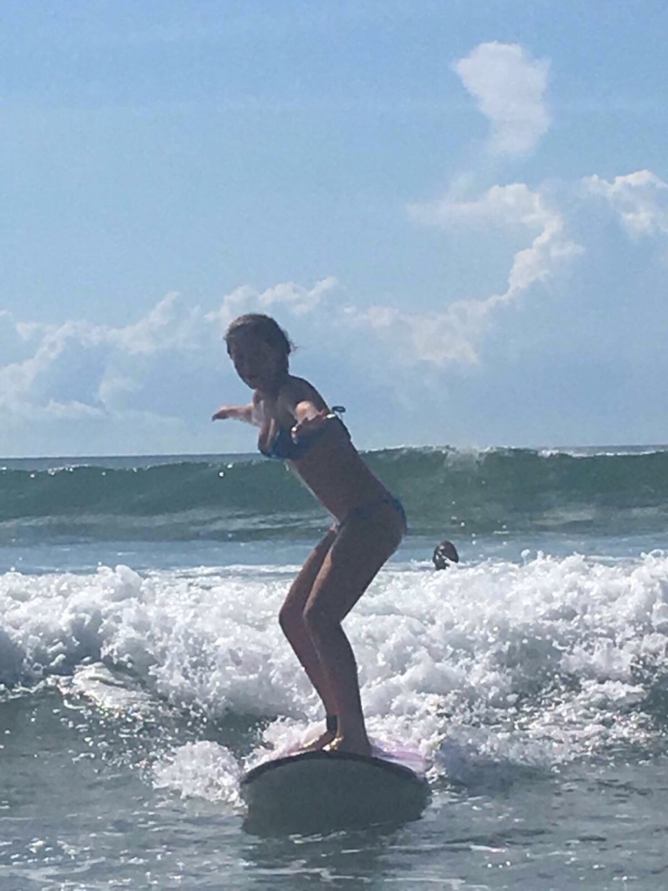 water, sea, leisure activity, lifestyles, full length, young adult, vacations, sky, waterfront, person, horizon over water, wave, enjoyment, beach, young women, fun, motion, nature