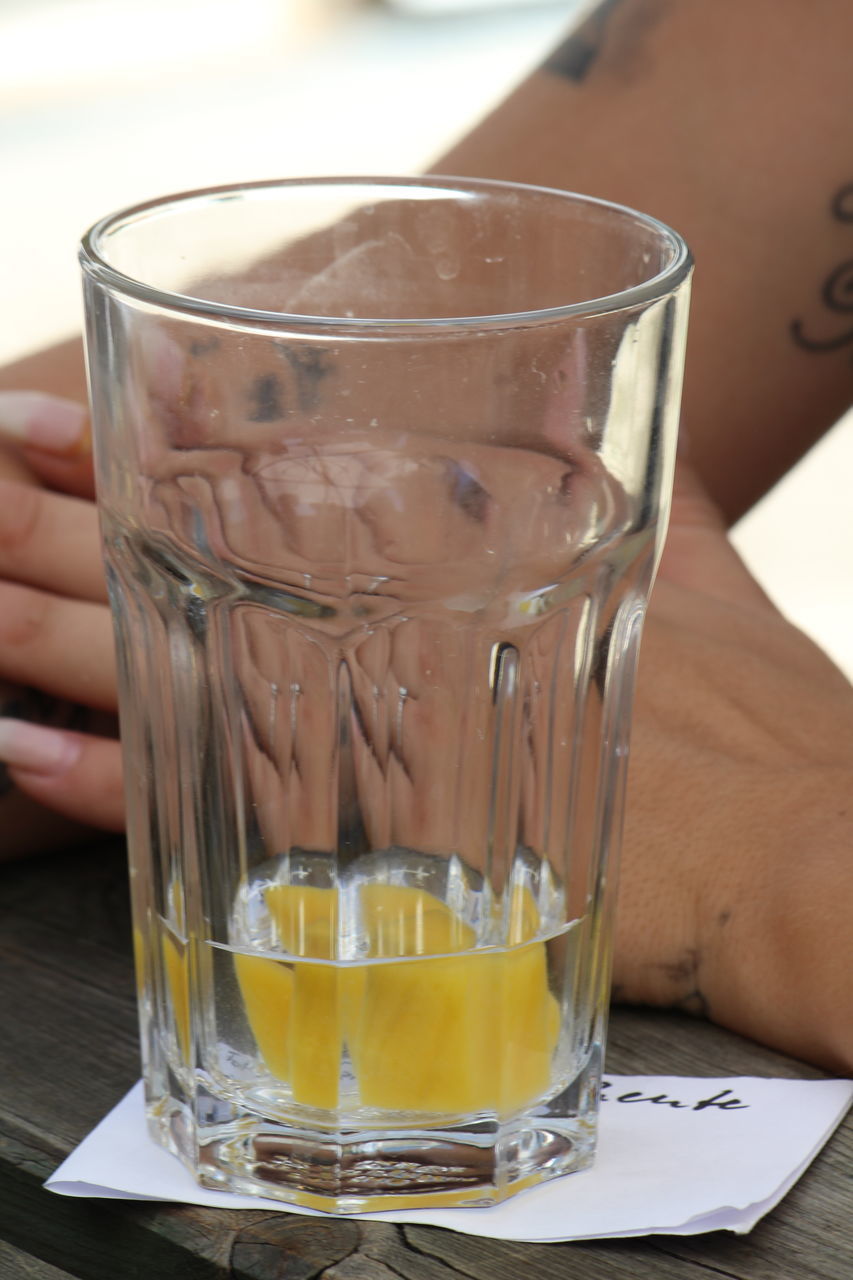 CLOSE-UP OF DRINK IN GLASS