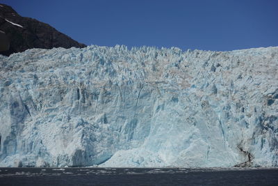 Scenic view of frozen sea against sky