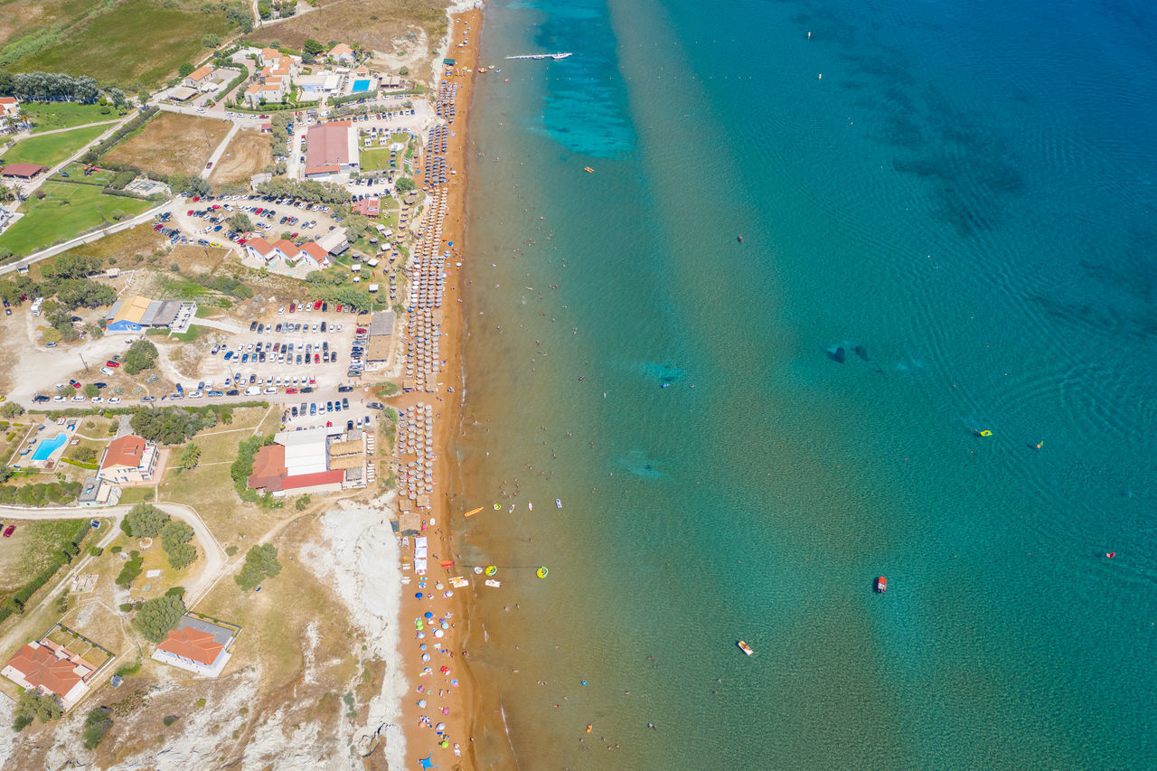 HIGH ANGLE VIEW OF SWIMMING POOL IN SEA