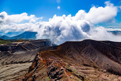 Panoramic view of volcanic landscape against sky