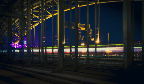 Illuminated city against sky at night