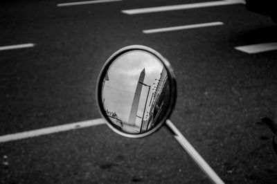 Close-up of reflection on road