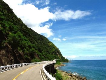 Country road leading towards sea