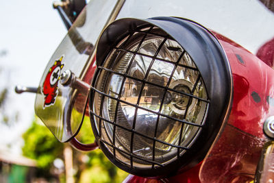 Close-up of camera against sky
