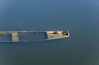 High angle view of boat sailing in sea