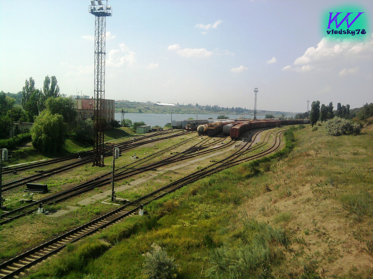 sky, transportation, railroad track, rail transportation, no people, freight train, train - vehicle, day, outdoors, tree, public transportation, nature