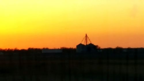 Scenic view of landscape at sunset