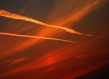 Low angle view of cloudy sky at sunset