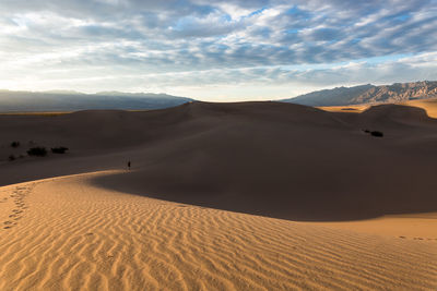 Scenic view of desert against sky