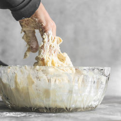 Close-up of hand holding ice cream