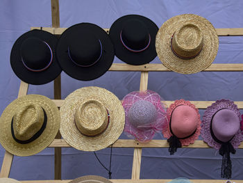 Various hats for sale at market stall