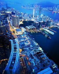 High angle view of illuminated buildings in city